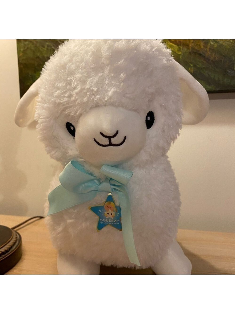 Vintage white 15” lambFAO Schwarz! Furr white & soft. Blue lights so endearing.